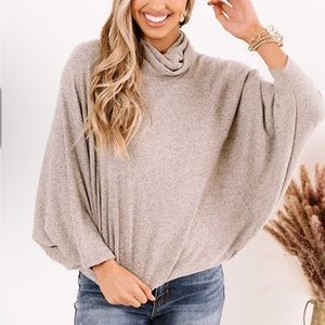 Tan turtleneck sweater